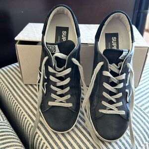 Woman’s Golden Goose Superstar.  Size 36.